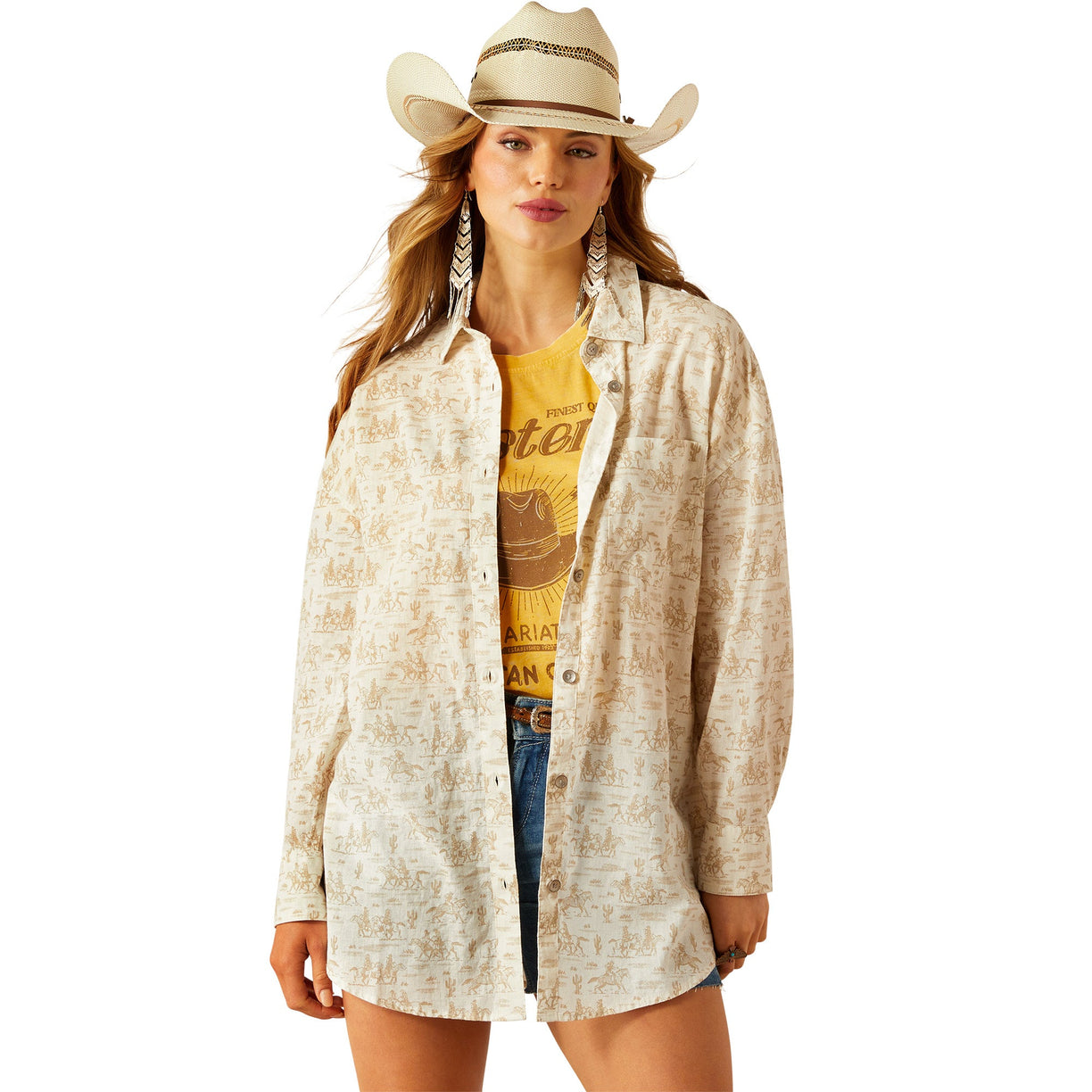 Woman wearing a beige cowboy hat and a patterned shirt on a white background
